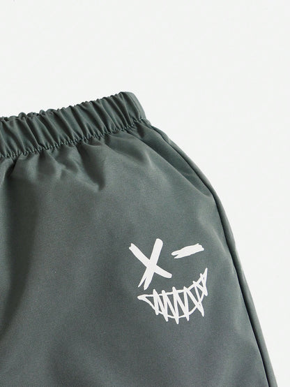 Young Boy Cartoon Graphic Flap Pocket Pants